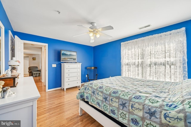 1402 Bonnett Pl Unit 131, Bel Air, MD 21015 - bedroom with light wood finished floors, baseboards, and ceiling fan