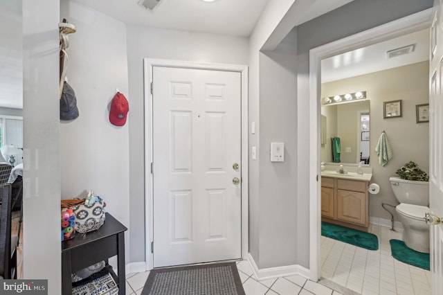1402 Bonnett Pl Unit 131, Bel Air, MD 21015 - foyer featuring light tile patterned flooring and baseboards
