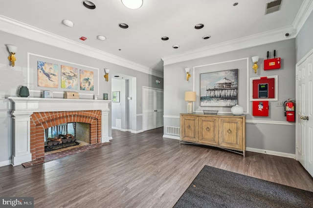 1402 Bonnett Pl Unit 131, Bel Air, MD 21015 - living room featuring ornamental molding, wood finished floors, a brick fireplace, baseboards, and recessed lighting