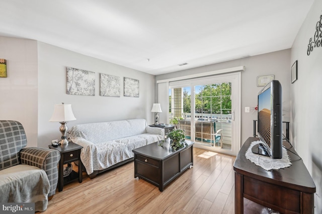 1402 Bonnett Pl Unit 131, Bel Air, MD 21015 - living area with light wood finished floors