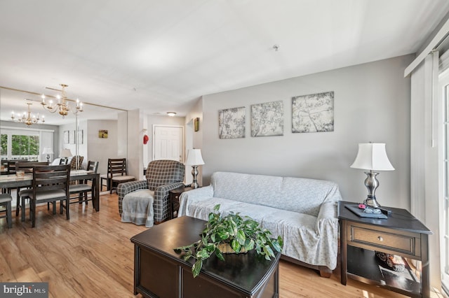 1402 Bonnett Pl Unit 131, Bel Air, MD 21015 - living area featuring a chandelier and light wood-type flooring