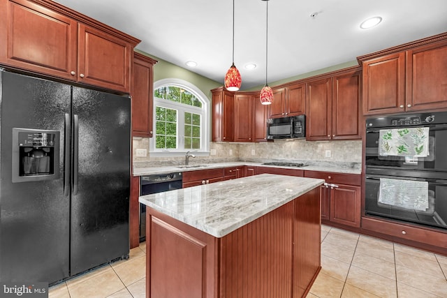 26635 Del Ibera Ct, Mechanicsville, MD 20659 - kitchen featuring black appliances, a sink, light tile patterned floors, a kitchen island, and light stone counters