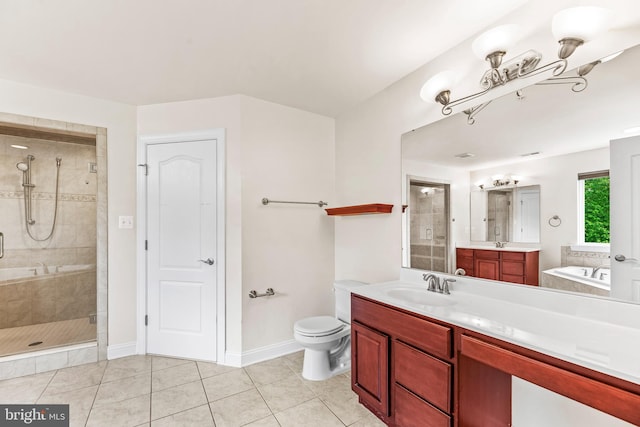 26635 Del Ibera Ct, Mechanicsville, MD 20659 - full bath featuring a stall shower, tile patterned flooring, a bath, baseboards, and vanity