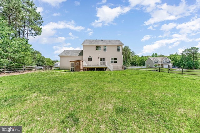 26635 Del Ibera Ct, Mechanicsville, MD 20659 - back of property featuring stairway and a wooden deck