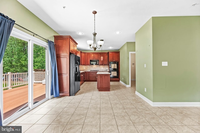 26635 Del Ibera Ct, Mechanicsville, MD 20659 - kitchen with black appliances, a chandelier, light tile patterned flooring, backsplash, and light countertops