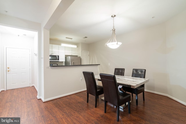 4320 Cannon Ridge Ct Unit 50, Fairfax, VA 22030 - dining space featuring baseboards and dark wood finished floors