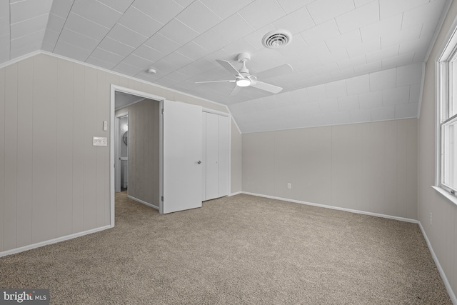21830 Vaughn Rd, Georgetown, DE 19947 - additional living space with a ceiling fan, carpet floors, lofted ceiling, plenty of natural light, and baseboards