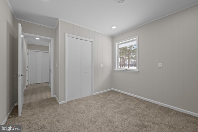 21830 Vaughn Rd, Georgetown, DE 19947 - unfurnished bedroom with crown molding, carpet, a closet, and baseboards