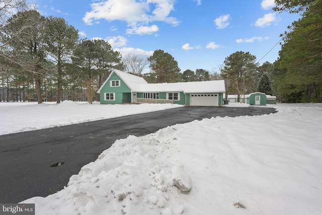 21830 Vaughn Rd, Georgetown, DE 19947 - view of front of property with a garage, driveway, and view of wooded area
