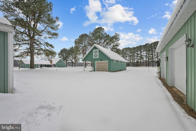 21830 Vaughn Rd, Georgetown, DE 19947 - snowy yard with an outdoor structure