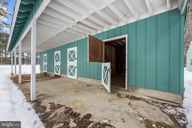 21830 Vaughn Rd, Georgetown, DE 19947 - view of exterior entry featuring board and batten siding