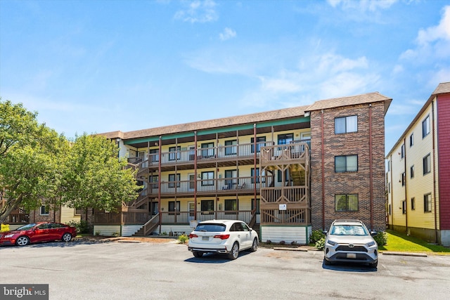 411 146th St Unit 332, Ocean City, MD 21842 - view of building exterior featuring uncovered parking