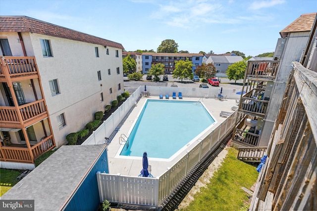 411 146th St Unit 332, Ocean City, MD 21842 - community pool featuring a fenced backyard and a residential view
