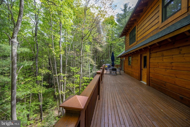 532 Pine Grove Rd, Lonaconing, MD 21539 - wooden terrace with a forest view and outdoor dining space