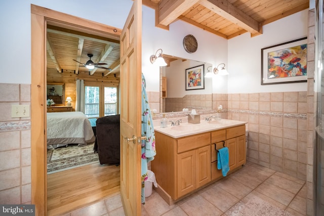532 Pine Grove Rd, Lonaconing, MD 21539 - full bathroom with wood ceiling with exposed beams, ensuite bath, tile walls, double vanity, and ceiling fan