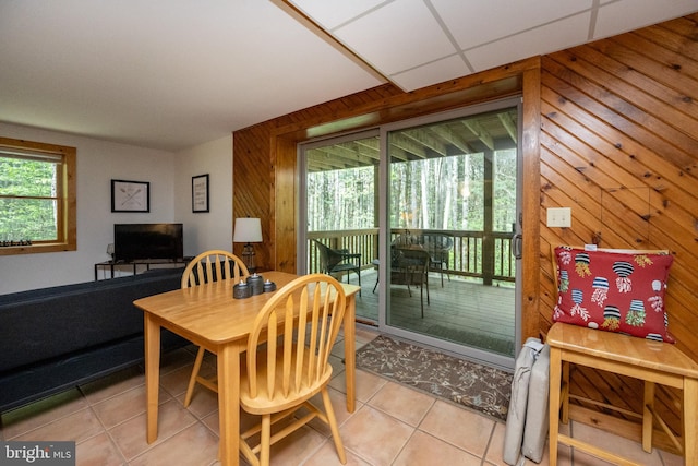 532 Pine Grove Rd, Lonaconing, MD 21539 - dining space featuring light tile patterned flooring and wooden walls