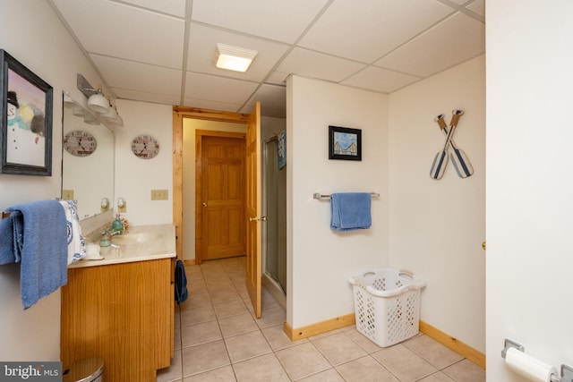 532 Pine Grove Rd, Lonaconing, MD 21539 - bathroom with tile patterned floors, a drop ceiling, a stall shower, vanity, and baseboards