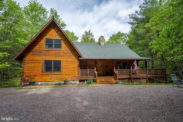 532 Pine Grove Rd, Lonaconing, MD 21539 - log-style house featuring a chimney and covered porch