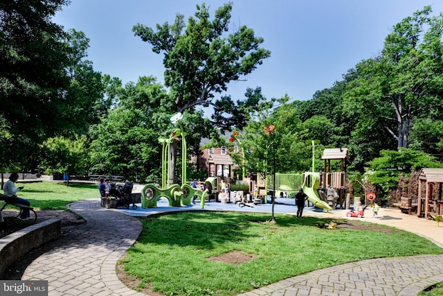 surrounding community featuring a lawn