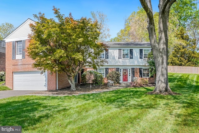 2003 Stratton Dr, Potomac, MD 20854 - colonial home with a garage, driveway, and brick siding