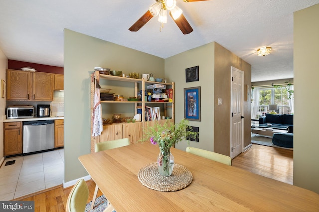 104 Braeburn Dr, Winchester, VA 22601 - dining space featuring light wood-style flooring, ceiling fan, and baseboards