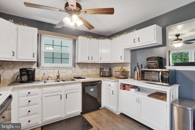 3308 Glen Hollow Dr Unit 103B, Dover, PA 17315 - kitchen featuring stainless steel microwave, dishwasher, a sink, a ceiling fan, and light wood-type flooring