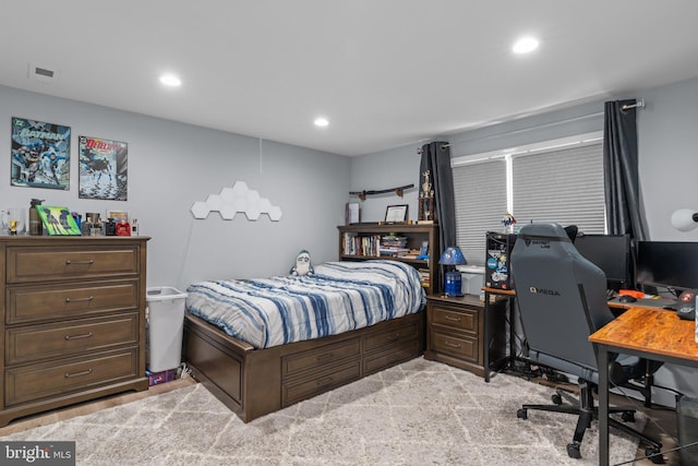 bedroom featuring a desk and recessed lighting