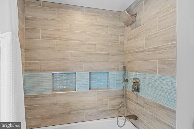 full bath featuring shower / tub combo with curtain