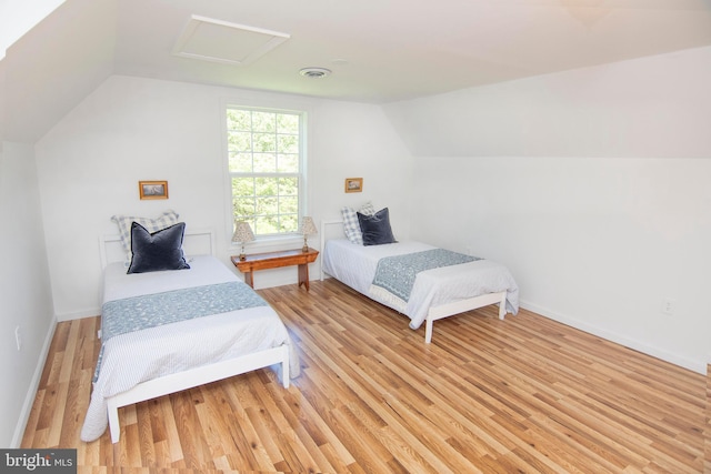 3516 Prospect Road, St, MD 21154 - bedroom with vaulted ceiling, wood finished floors, attic access, and baseboards