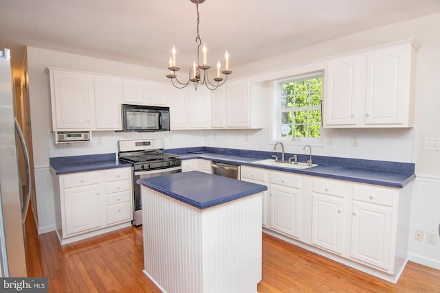3516 Prospect Road, St, MD 21154 - kitchen featuring stainless steel appliances, a sink, dark countertops, and a chandelier