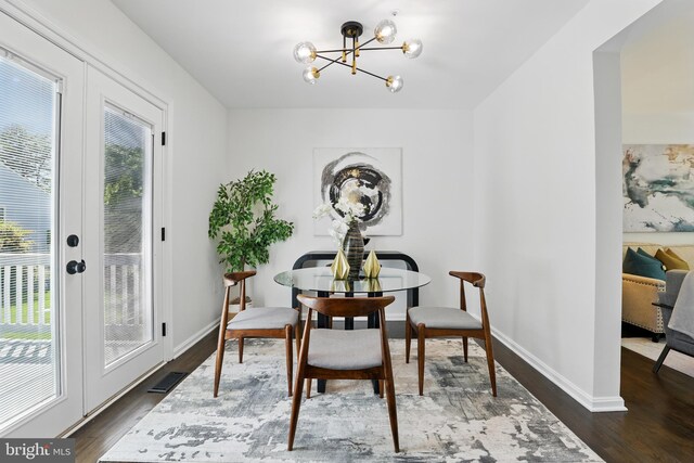 6019 Surrey Square Ln, District Heights, MD 20747 - dining room with a chandelier, wood finished floors, baseboards, and french doors