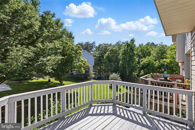6019 Surrey Square Ln, District Heights, MD 20747 - wooden terrace featuring a yard