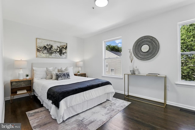 6019 Surrey Square Ln, District Heights, MD 20747 - bedroom featuring wood finished floors and baseboards
