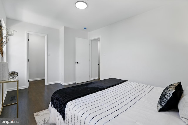 6019 Surrey Square Ln, District Heights, MD 20747 - bedroom with wood finished floors and baseboards