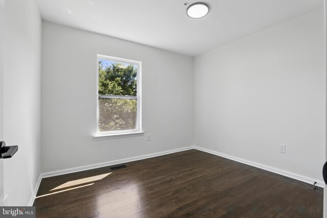 6019 Surrey Square Ln, District Heights, MD 20747 - unfurnished room featuring wood finished floors and baseboards