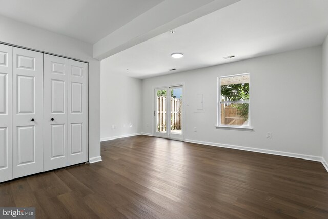 6019 Surrey Square Ln, District Heights, MD 20747 - unfurnished bedroom with dark wood-style floors, access to outside, and baseboards