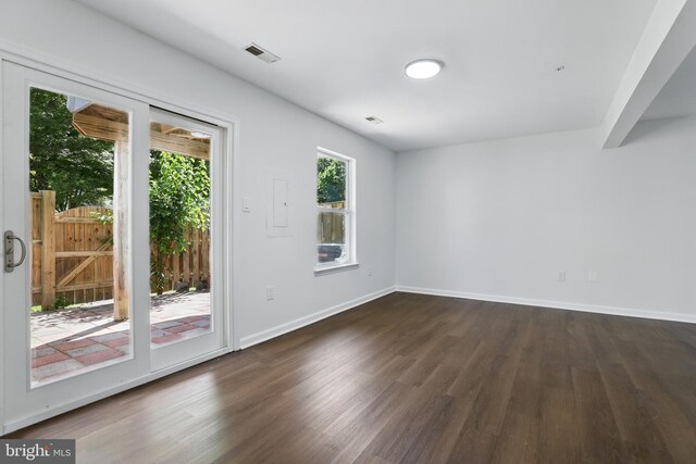 6019 Surrey Square Ln, District Heights, MD 20747 - empty room featuring dark wood-style flooring and baseboards
