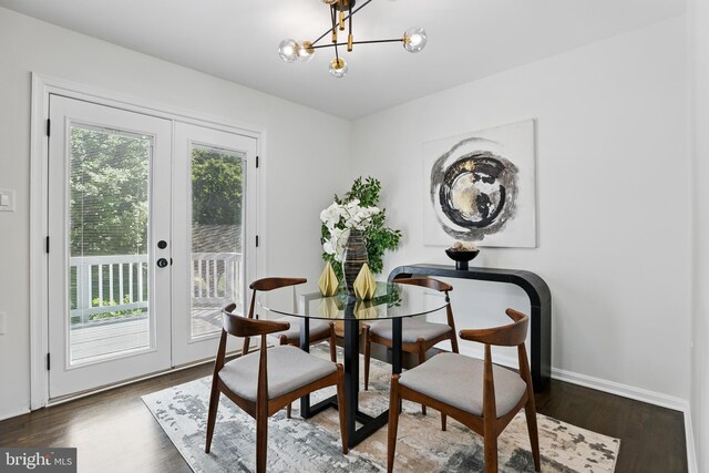 6019 Surrey Square Ln, District Heights, MD 20747 - dining space with french doors, plenty of natural light, wood finished floors, and a chandelier