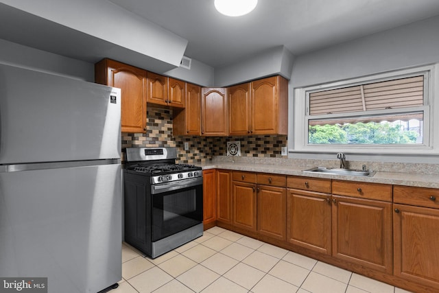 3583 Nottingham Ln, Philadelphia, PA 19114 - kitchen featuring stainless steel appliances, a sink, brown cabinetry, and backsplash