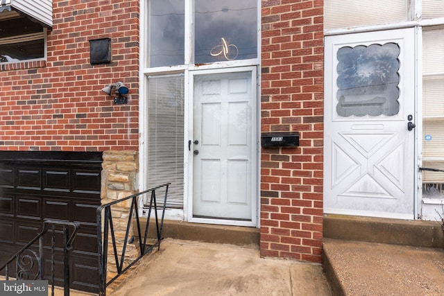 3583 Nottingham Ln, Philadelphia, PA 19114 - entrance to property featuring brick siding and a garage