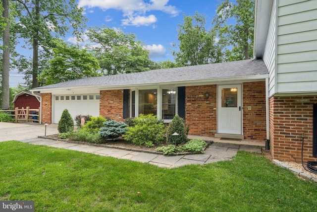 5 Kings House Ct, Silver Spring, MD 20905 - view of front of home featuring a front yard, a garage, brick siding, and driveway