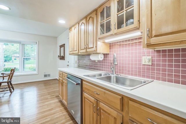 5 Kings House Ct, Silver Spring, MD 20905 - kitchen featuring stainless steel dishwasher, backsplash, light countertops, light wood-style floors, and glass insert cabinets