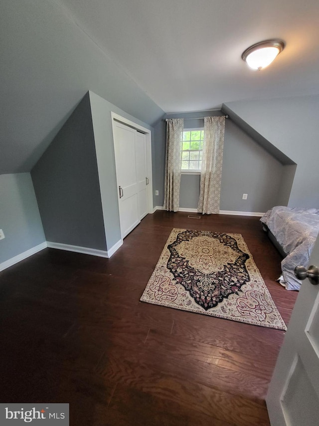 1211 Williamsville Rd, Houston, DE 19954 - bonus room with baseboards, wood finished floors, and lofted ceiling