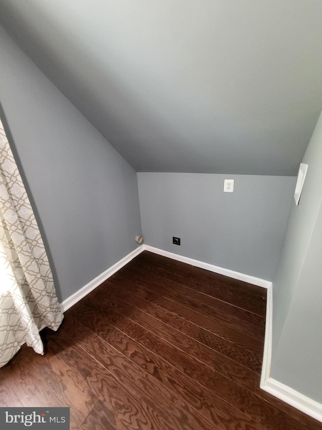 1211 Williamsville Rd, Houston, DE 19954 - bonus room featuring lofted ceiling, baseboards, and dark wood finished floors