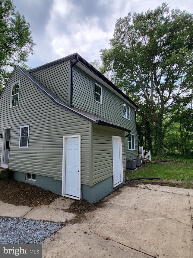 1211 Williamsville Rd, Houston, DE 19954 - rear view of house with cooling unit and a patio area