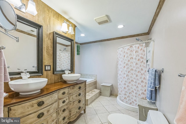 bathroom with crown molding, curtained shower, tile patterned flooring, double vanity, and toilet