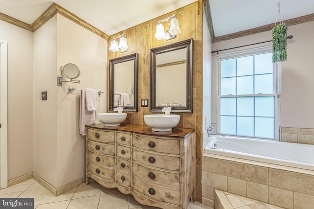 bathroom with crown molding, plenty of natural light, double vanity, tile patterned floors, and a bath