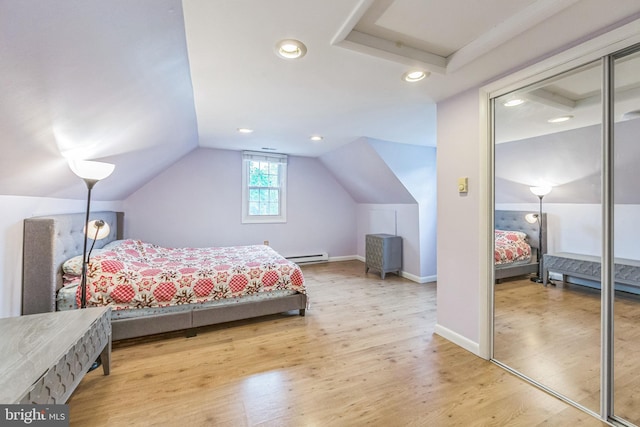 bedroom with a baseboard radiator, vaulted ceiling, light wood-type flooring, recessed lighting, and baseboards