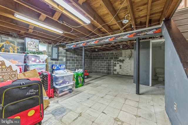 unfinished basement with tile patterned floors
