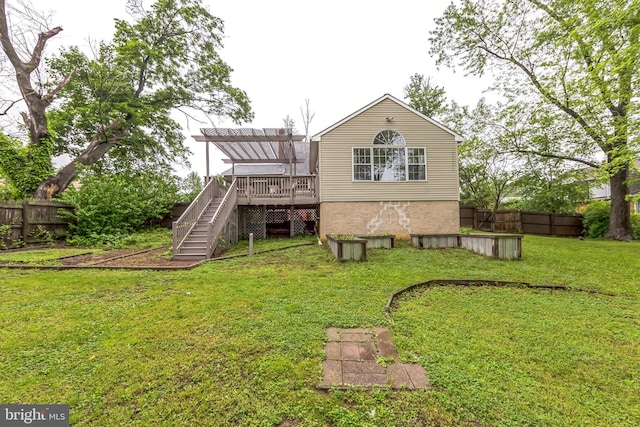rear view of property with a deck, stairs, and a pergola